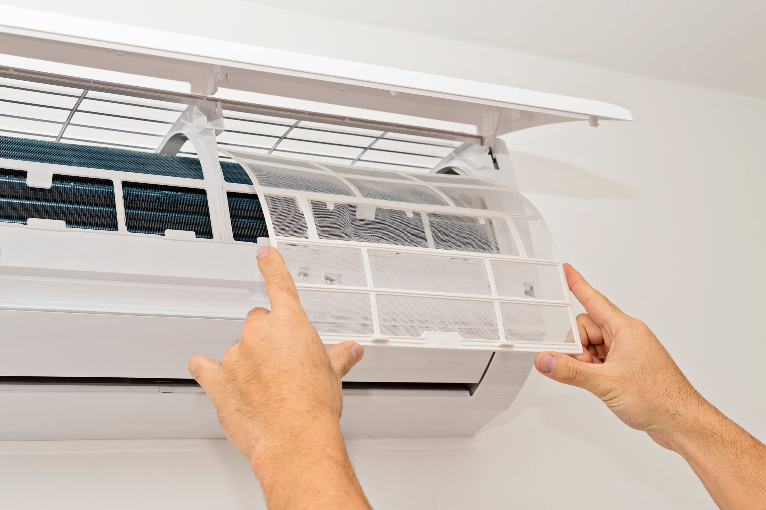 Changing the Filter in the Air Conditioning The Concept of Safe and Healthy Housing